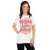White t-shirt with bold pink and orange “Remember to Love Yourself” motivational design – Shai Valley